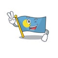 Funny flag palau Scroll cartoon Character with two fingers