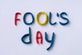 Funny font April Fools` Day, written in plasticine. Fools day phrase from plasticine, letters on white background Royalty Free Stock Photo
