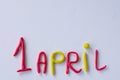 Funny font April Fools` Day, written in plasticine. Fools day phrase from plasticine, letters on white background Royalty Free Stock Photo