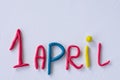 Funny font April Fools` Day, written in plasticine. Fools day phrase from plasticine, letters on white background Royalty Free Stock Photo