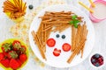 Funny food art idea for healthy baby girl breakfast - cookies st