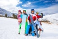 Funny friends with snowboards and skis Royalty Free Stock Photo