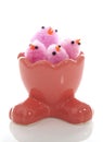 Funny fuffy pink easter eggs in holder