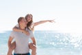 Funny games happy couple in love on the beach Royalty Free Stock Photo