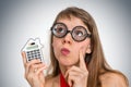 Funny geek or nerd school woman with calculator