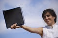 Funny girl with a black notebook Royalty Free Stock Photo