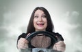 Funny girl with car wheel and smoke Royalty Free Stock Photo