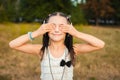 Funny girl closing eyes with hands Royalty Free Stock Photo