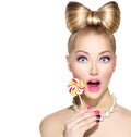 Funny girl eating lollipop Royalty Free Stock Photo