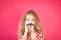 Funny girl with fake moustache