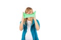 Funny girl holding green slime looks like gunk in front of her f Royalty Free Stock Photo