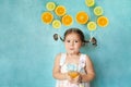 Smiling girl drinks fresh orange juice Royalty Free Stock Photo