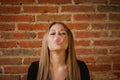 Funny girl making a pomp with a bubble gum Royalty Free Stock Photo