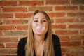 Funny girl making a pomp with a bubble gum Royalty Free Stock Photo