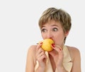 Funny girl with a pear Royalty Free Stock Photo