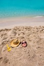 Funny girl playing buried in beach sand smiling sunglasses Royalty Free Stock Photo