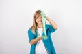 Funny girl playing with green slime looks like gunk Royalty Free Stock Photo