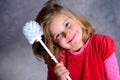 Funny girl playing with toilet brush