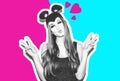 Funny girl represents a small cat or mouse. Woman with a bright makeup hairstyle and night dress mouse ears having fun Royalty Free Stock Photo