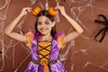 funny girl with spiderweb makeup smiling Royalty Free Stock Photo