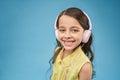 Funny girl wearing headphones listening music smiling Royalty Free Stock Photo