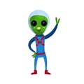 Funny green alien with big eyes wearing blue space suit waving his hand, alien positive character cartoon vector Royalty Free Stock Photo