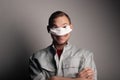 Funny guy mischievous in a medical mask Royalty Free Stock Photo