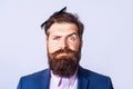 Funny hairstyle, modern haircut. Man styling his hair with a comb. Bearded man with beard, bearded gay. Royalty Free Stock Photo