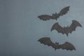 Funny Halloween background. Cute black little bats. Traditional festive symbol, flat lay