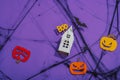 Funny Halloween background. Scary spider web, traditional fall pumpkins, house, bats and spiders Royalty Free Stock Photo