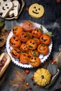 Funny halloween food on a rustic table