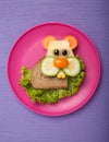 Funny hamster made of bread and vegetables