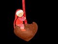 Funny handicraft of a small child sitting on a gingerbread heart made of paper by a child Royalty Free Stock Photo