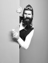Funny handsome bearded pilot on colorful studio background Royalty Free Stock Photo