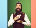 Funny handsome bearded pilot and glasses on colorful studio background Royalty Free Stock Photo