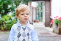 Funny happy and smiling kid boy on way to nursery Royalty Free Stock Photo