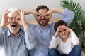 Funny head shot portrait grandfather, father and son, three generations