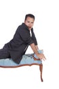 Funny Hispanic Man Posing on Chair