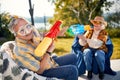 Funny holiday.Senior couple   playing with water gun Royalty Free Stock Photo