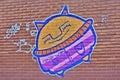 Funny humorous graffiti on a urban wall Royalty Free Stock Photo