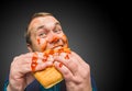 Funny hungry fat man dirty by ketchup Royalty Free Stock Photo