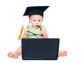 Funny Intelligent Child in Graduation Hat with Computer holding Eyeglasses. Curious Baby using Black Notebook looking at Camera Royalty Free Stock Photo