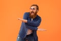 Funny joyful redhaired man with beard in sunglasses dancing, studio Royalty Free Stock Photo