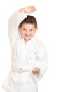Funny karate kid in defense stance