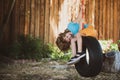 Funny kid boy having fun with chain swing on outdoor playground. Child playing on outdoor playground. Kids play on Royalty Free Stock Photo