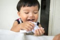 Funny kid creating something different and laughing. Creativity concept