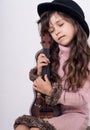 Funny kid girl with guitar, ukulele guitar.