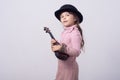 Funny kid girl with guitar, ukulele guitar.