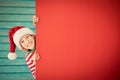 Funny kid holding cardboard banner blank