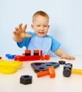 Funny kid playing with color parts Royalty Free Stock Photo